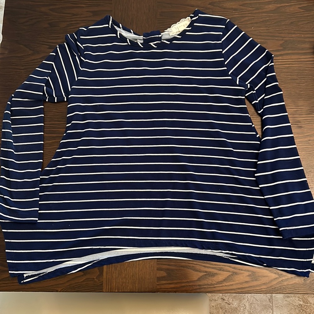 Both shirts excellent condition one brand is Between Me other Copper Key